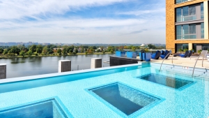 The glass-bottomed pool looks into The Anthem&#039;s lobby below